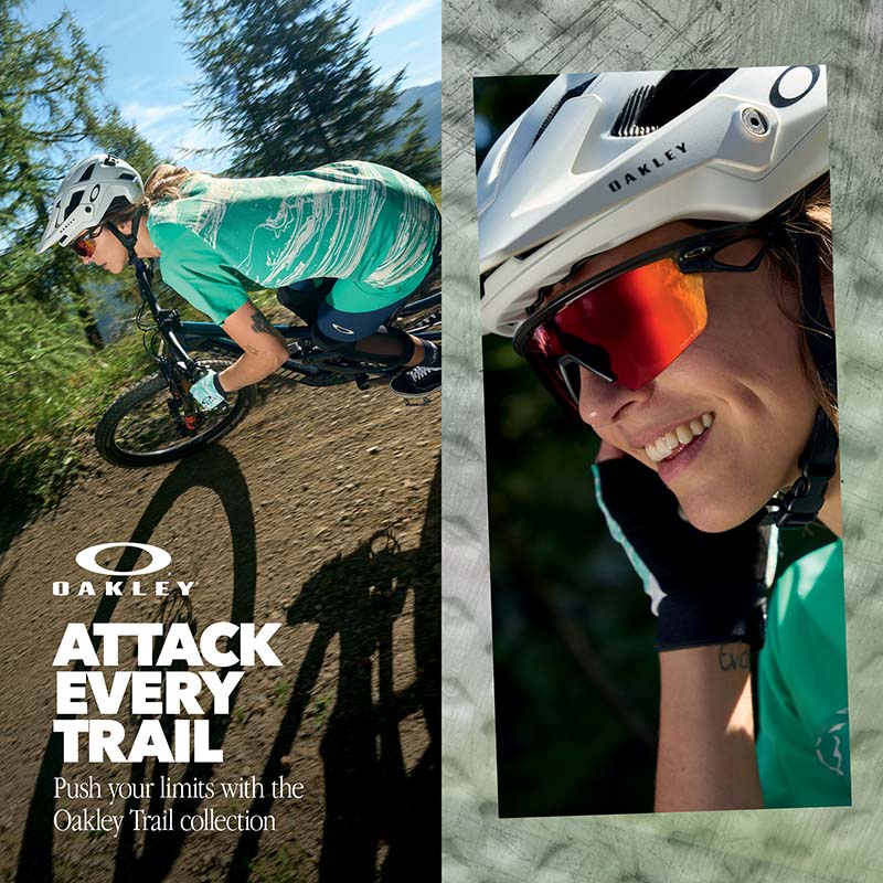Woman riding bike on trail modeling Oakley sunwear